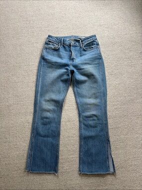 Women's High-Rise Blue Flared Jeans with Split Ankle and Raw Hem